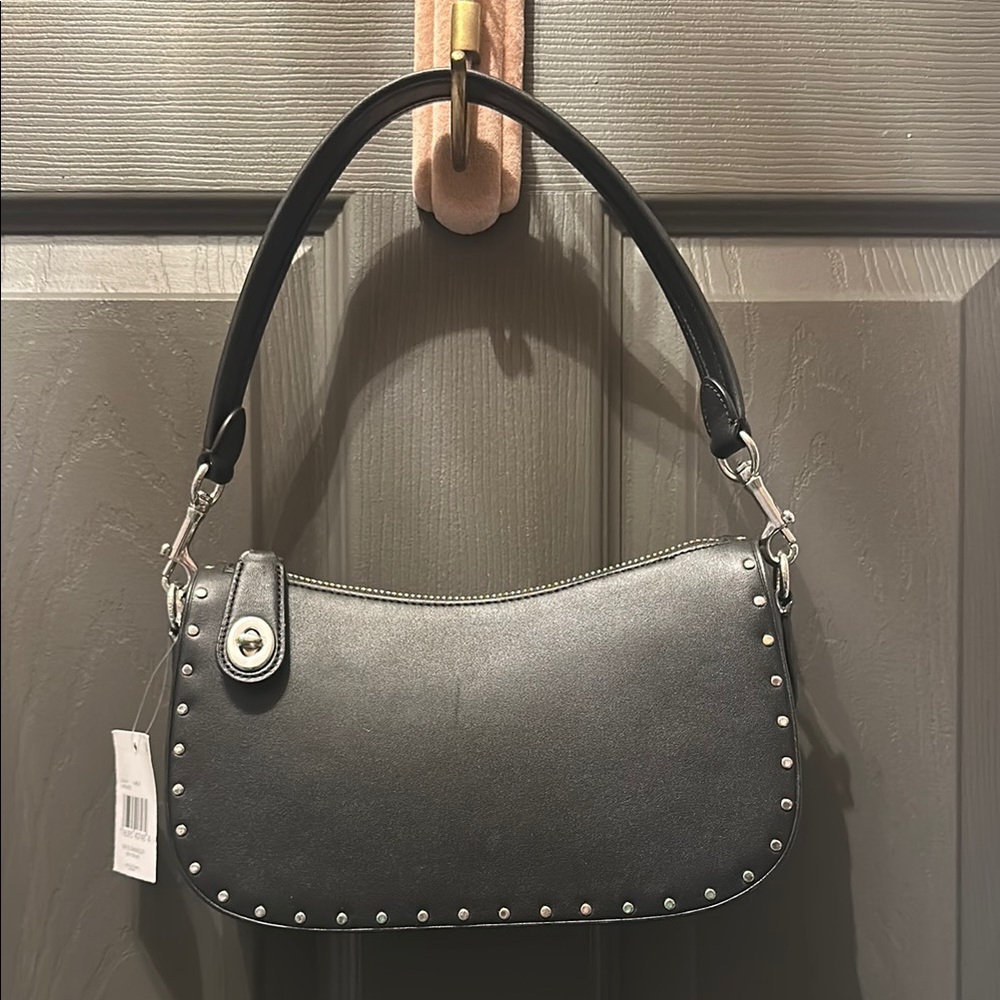 Coach Black Rivet stud swinger